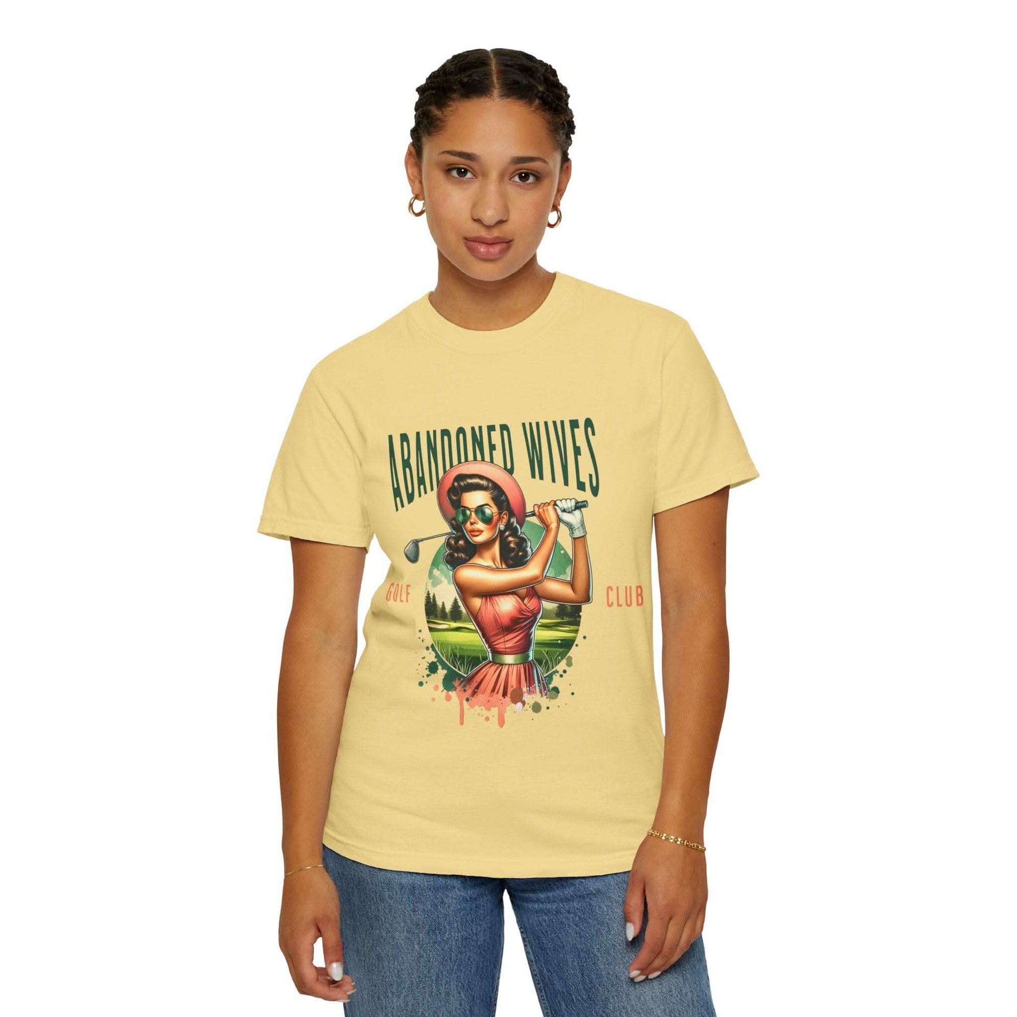 Vintage unisex t-shirt with humorous Abandoned Wives Golf Club graphic, soft garment-dyed cotton, available in multiple colors and sizes