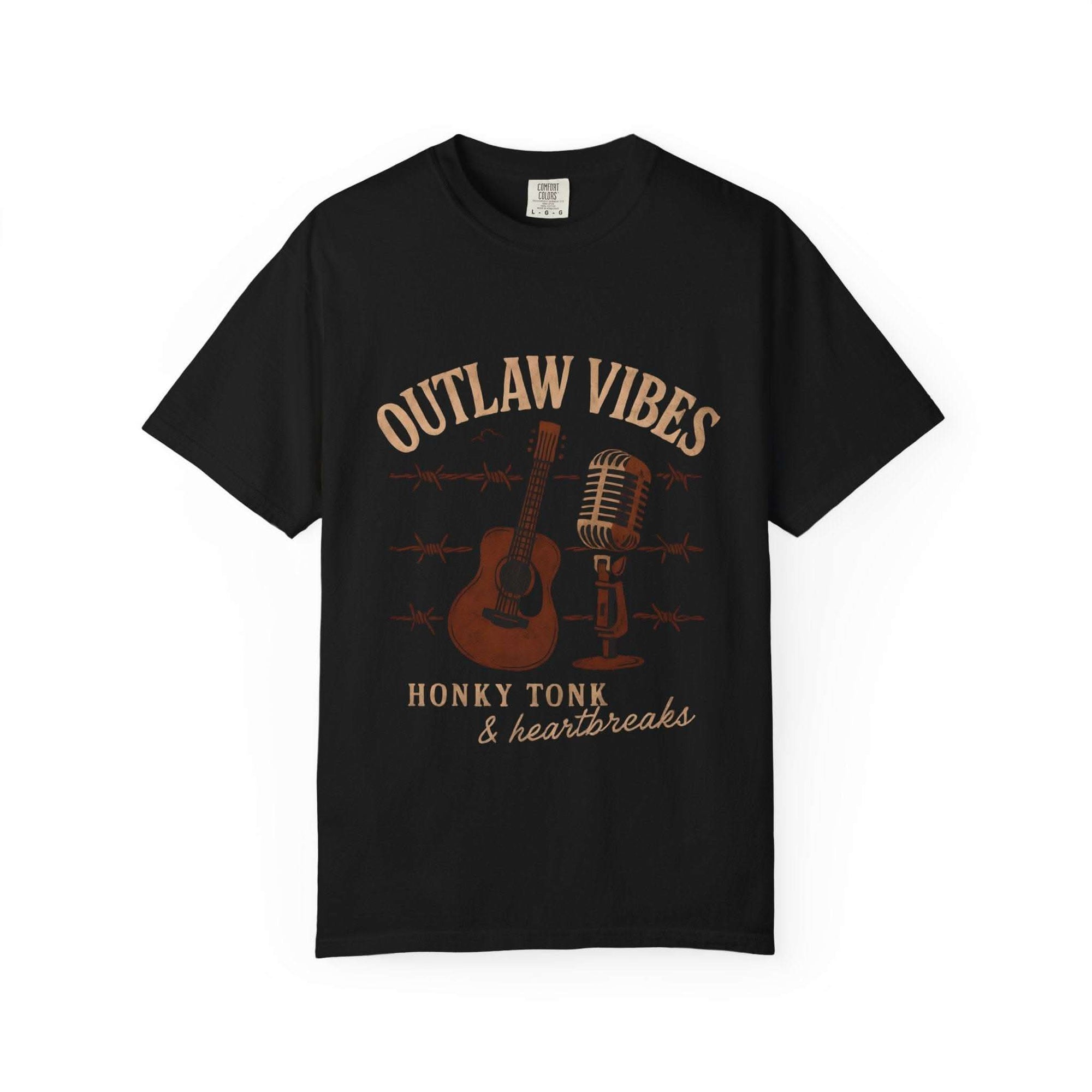 Black t-shirt with 'Outlaw Vibes' graphic design featuring a guitar, microphone, and barbed wire on a white background.