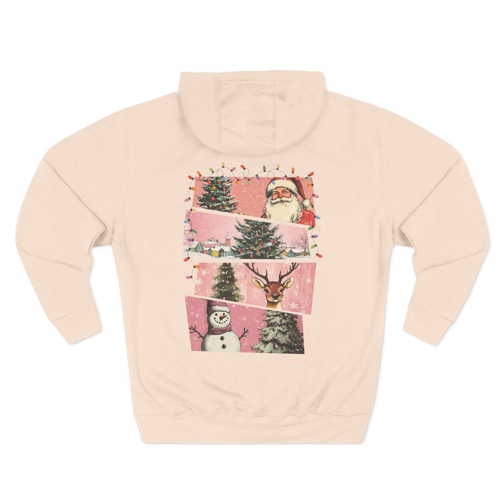 Pink fleece hoodie with Christmas watercolor swatches featuring Santa, trees, snowman, and reindeer design