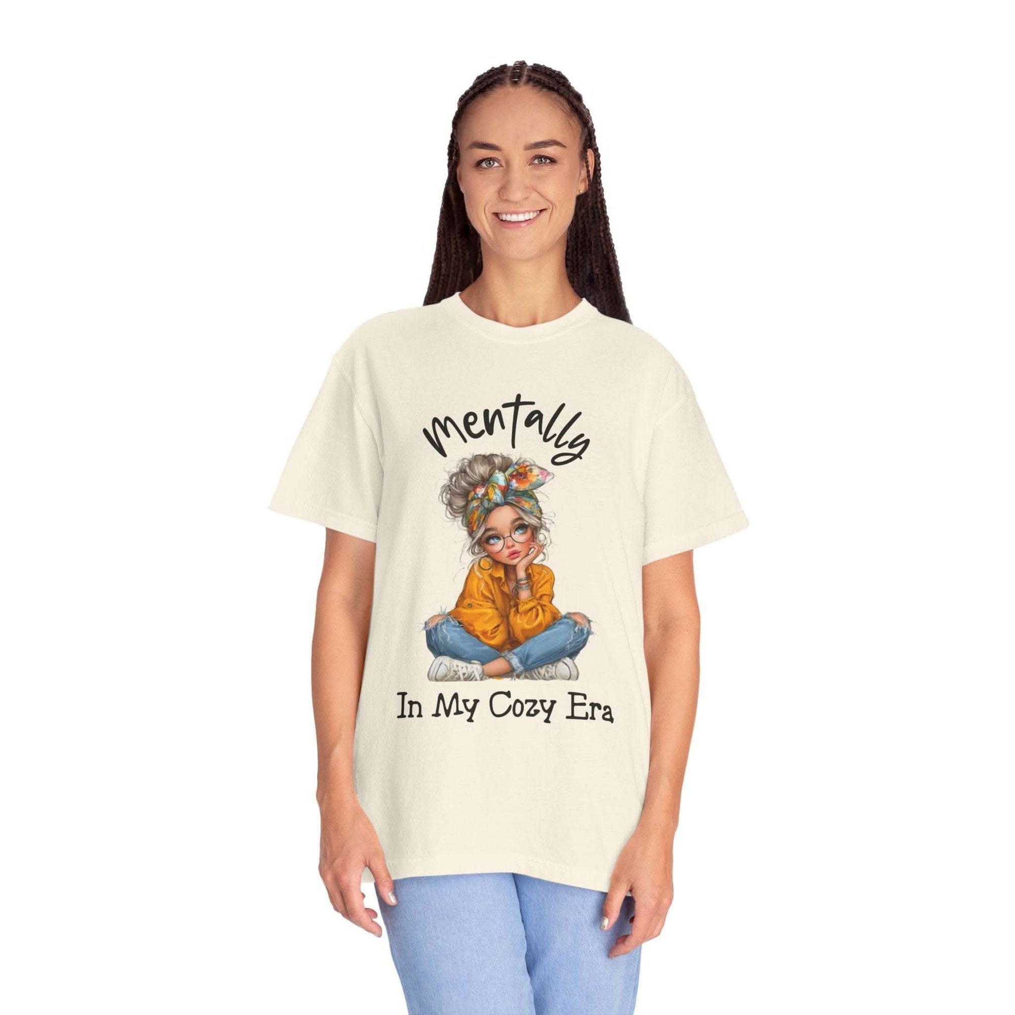 Woman wearing a t-shirt with a graphic and text on a white background