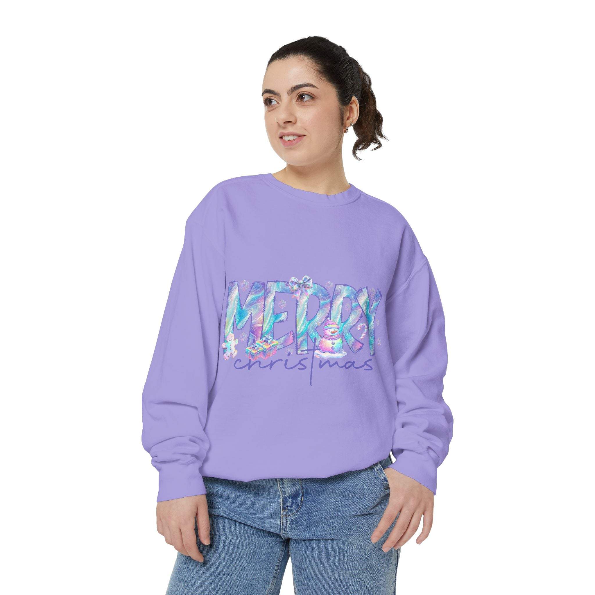 Woman wearing a lavender iridescent Merry Christmas sweatshirt with relaxed fit and casual jeans