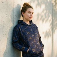 Unisex blue zodiac constellation hoodie with celestial print on soft cotton fabric