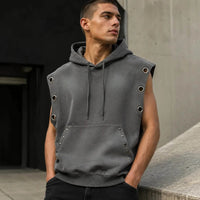 Unisex sleeveless hoodie with vintage wash sun fade, oversized eyelets, and charcoal industrial look