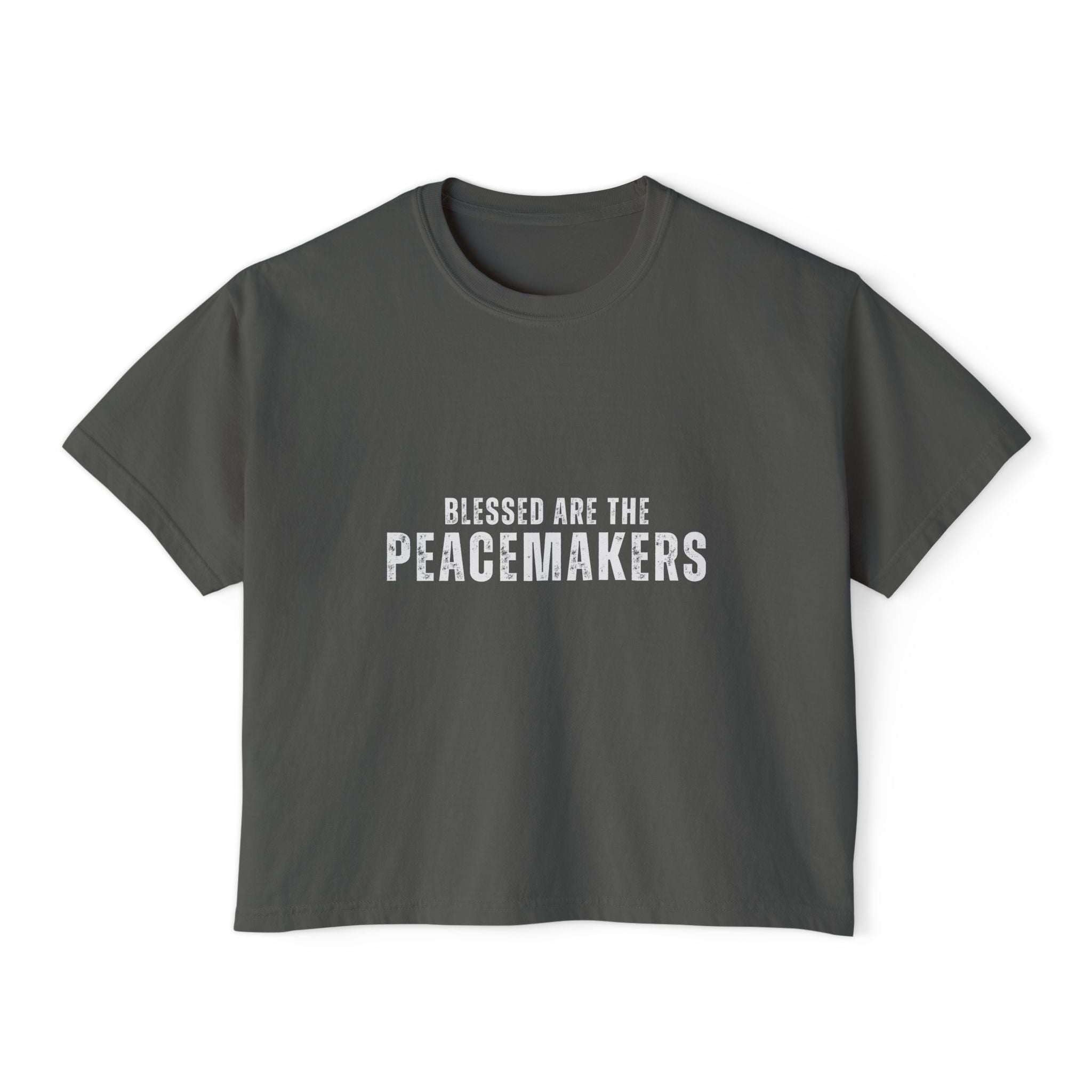 Women's boxy tee shirt with "Blessed be the Peacemakers" text in vintage pigment dye color