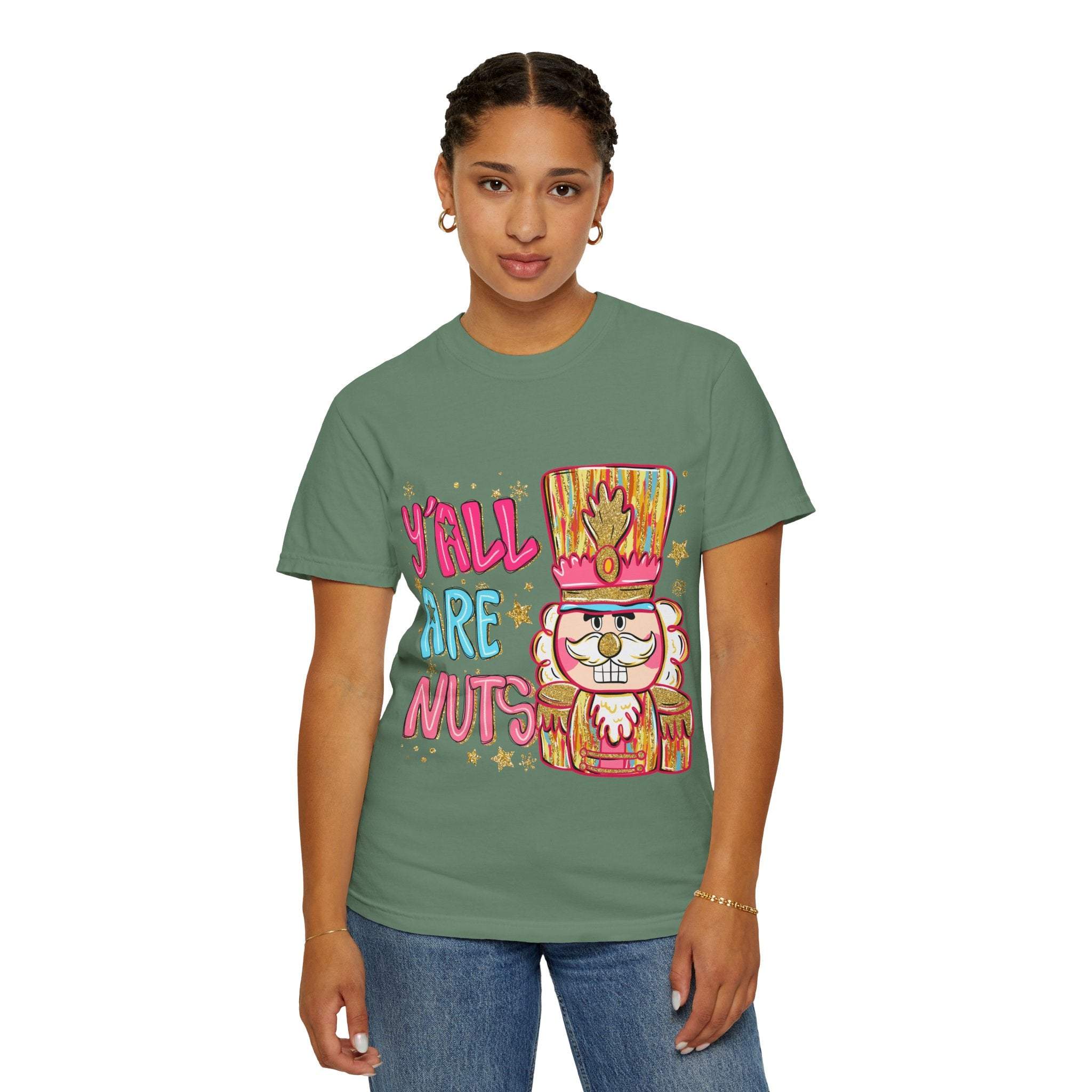 Woman wearing green Yall Are Nuts Nutcracker festive graphic t-shirt