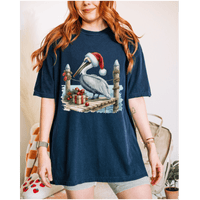 Christmas Pelican Santa T-Shirt with pelican dressed as Santa Claus on festive beach holiday tee