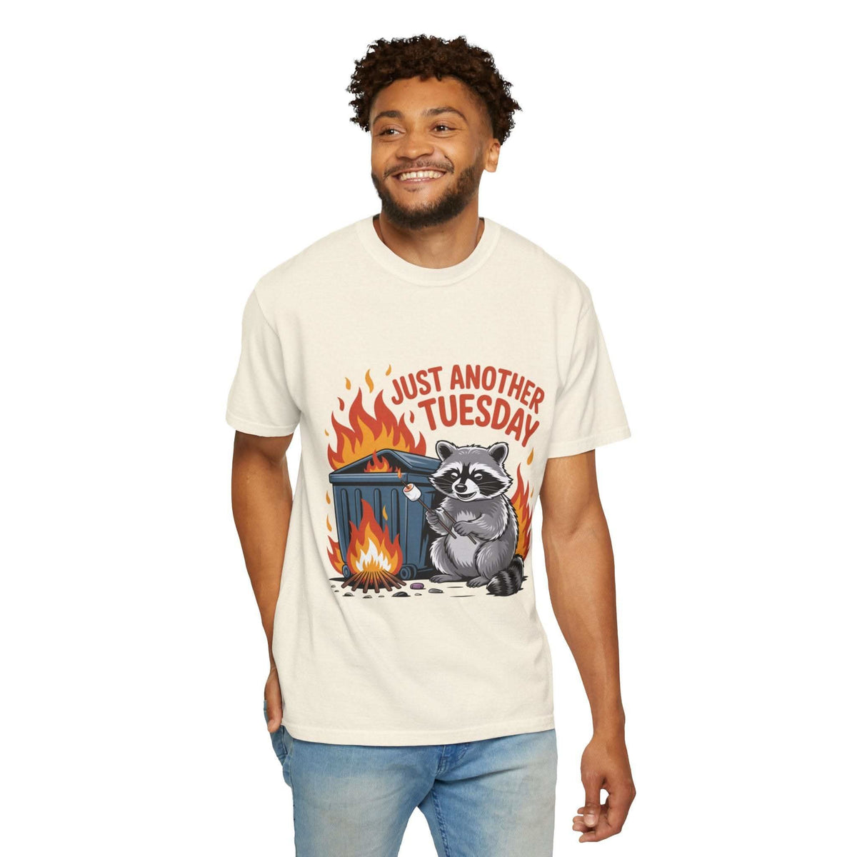 Man wearing a t-shirt with a raccoon graphic and text on a white background