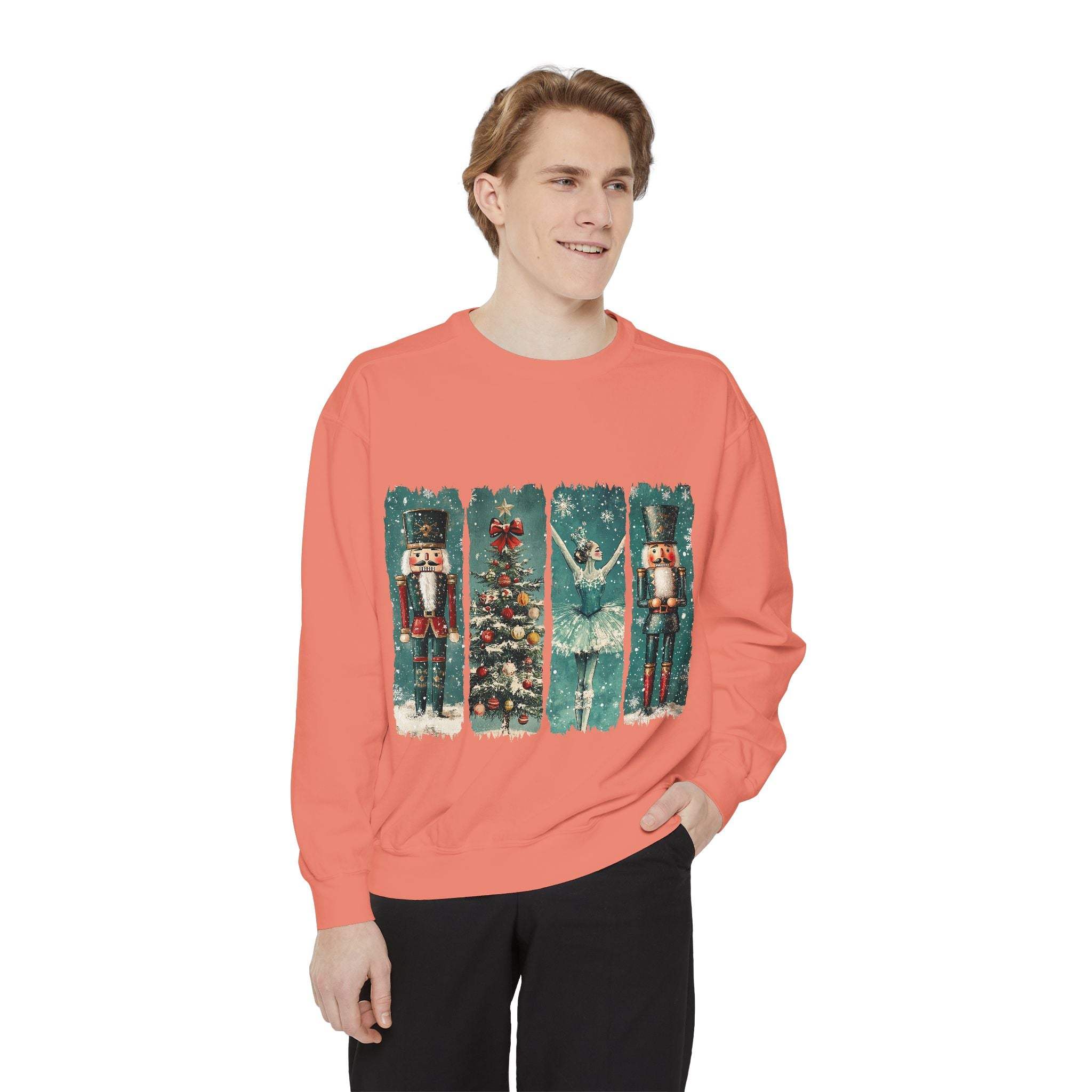Man wearing vintage Christmas nutcracker sweatshirt with holiday watercolor design on coral fabric