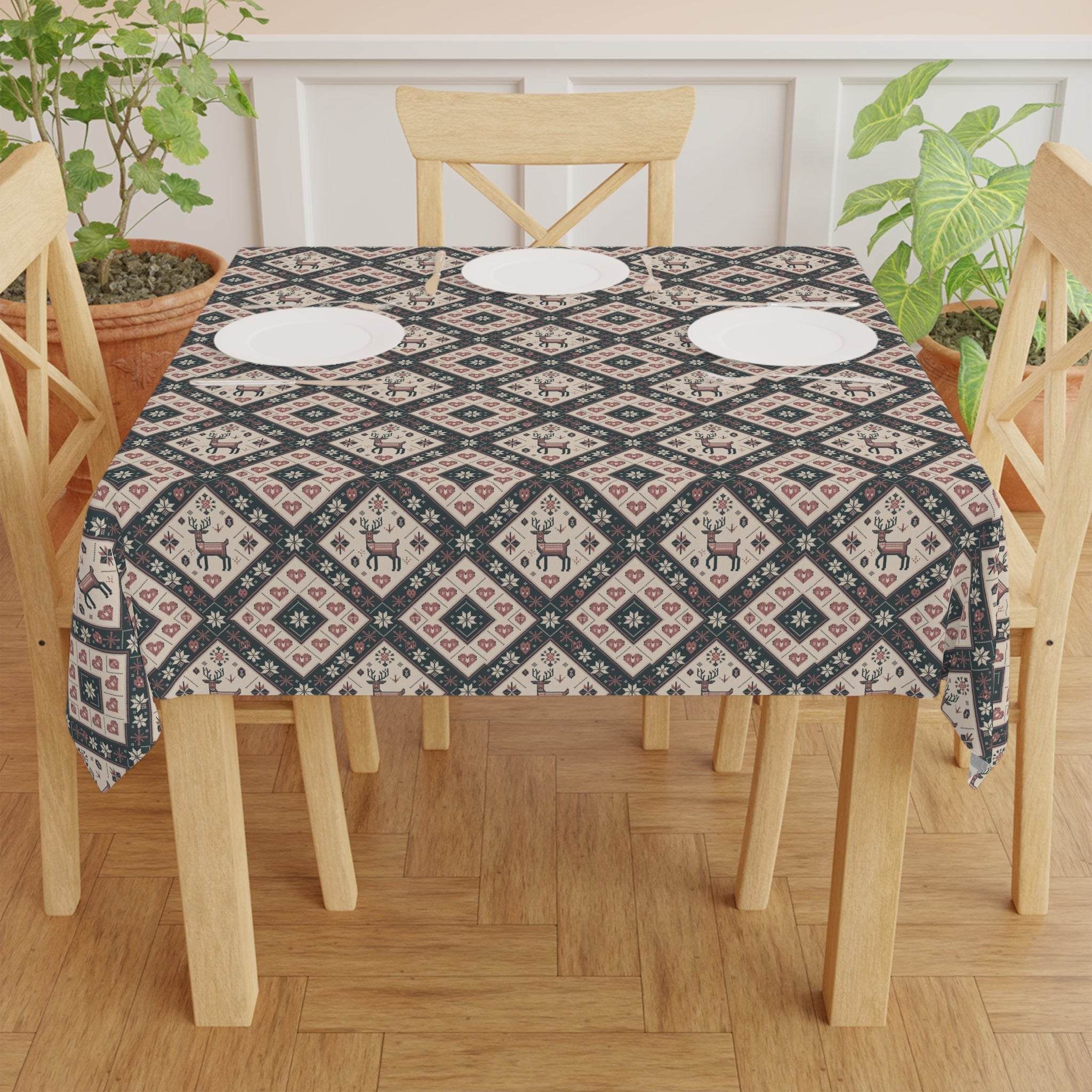 Winter Nordic Scandinavian tablecloth with reindeer and geometric patterns on wooden dining table