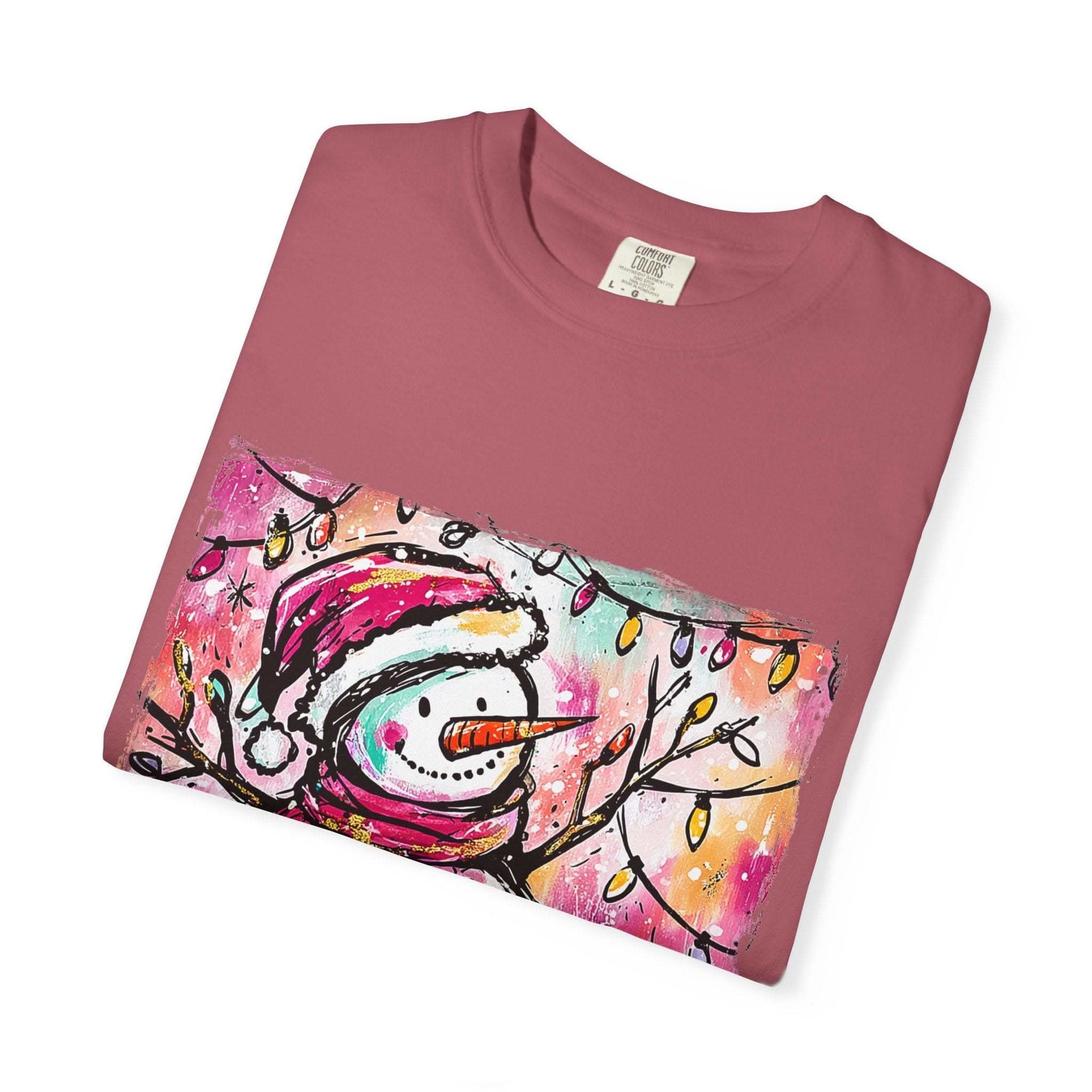 White unisex t-shirt featuring colorful disco ball snowman design, perfect for Christmas and dance parties by Printify