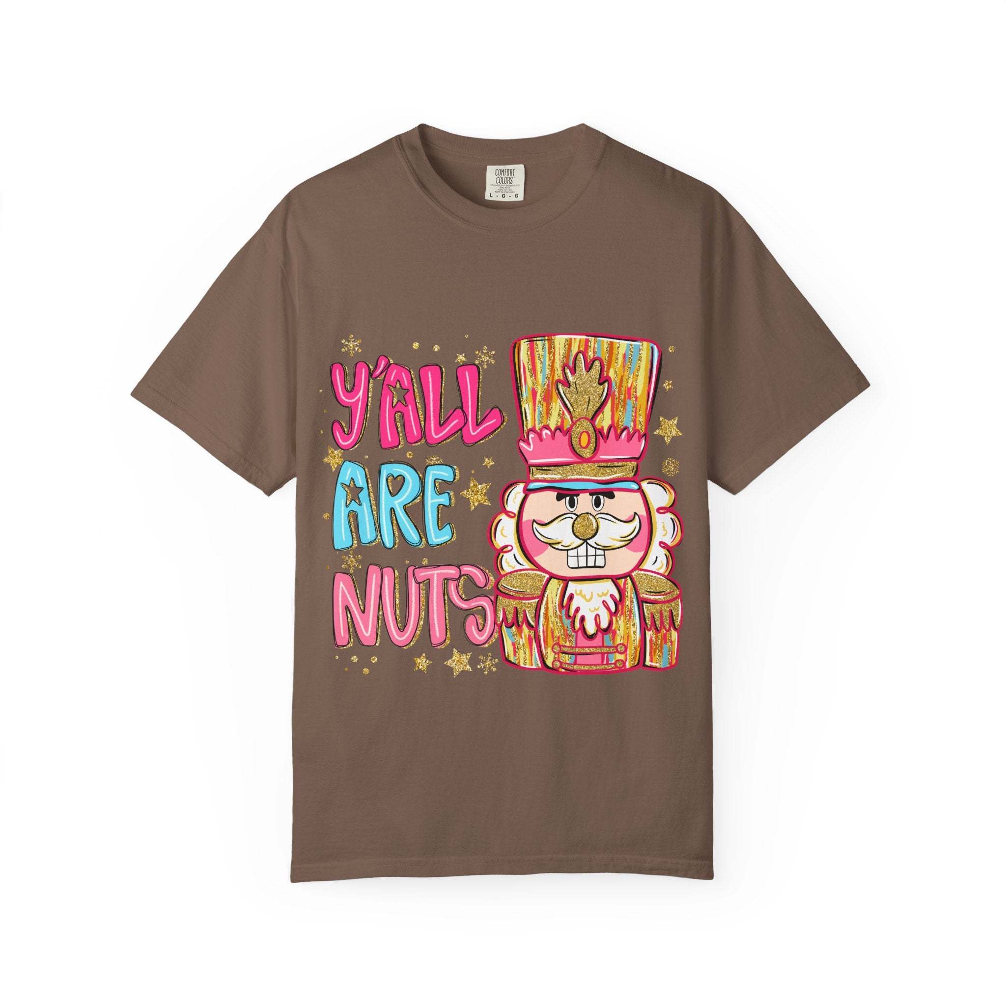 brown T-shirt with colorful "Yall Are Nuts" text and festive nutcracker graphic