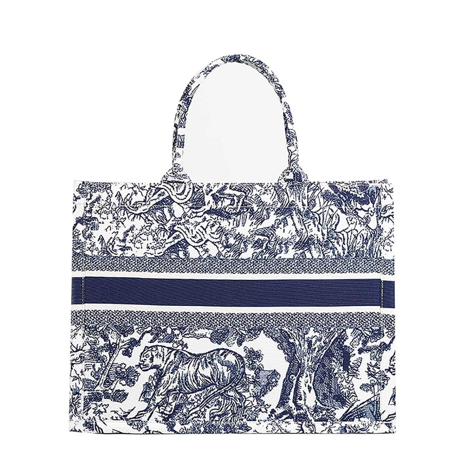 Large canvas embroidered tote bag with zipper closure and single shoulder strap