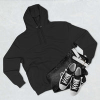 Black fleece hoodie with adjustable hood and front pocket styled with black jeans and sneakers