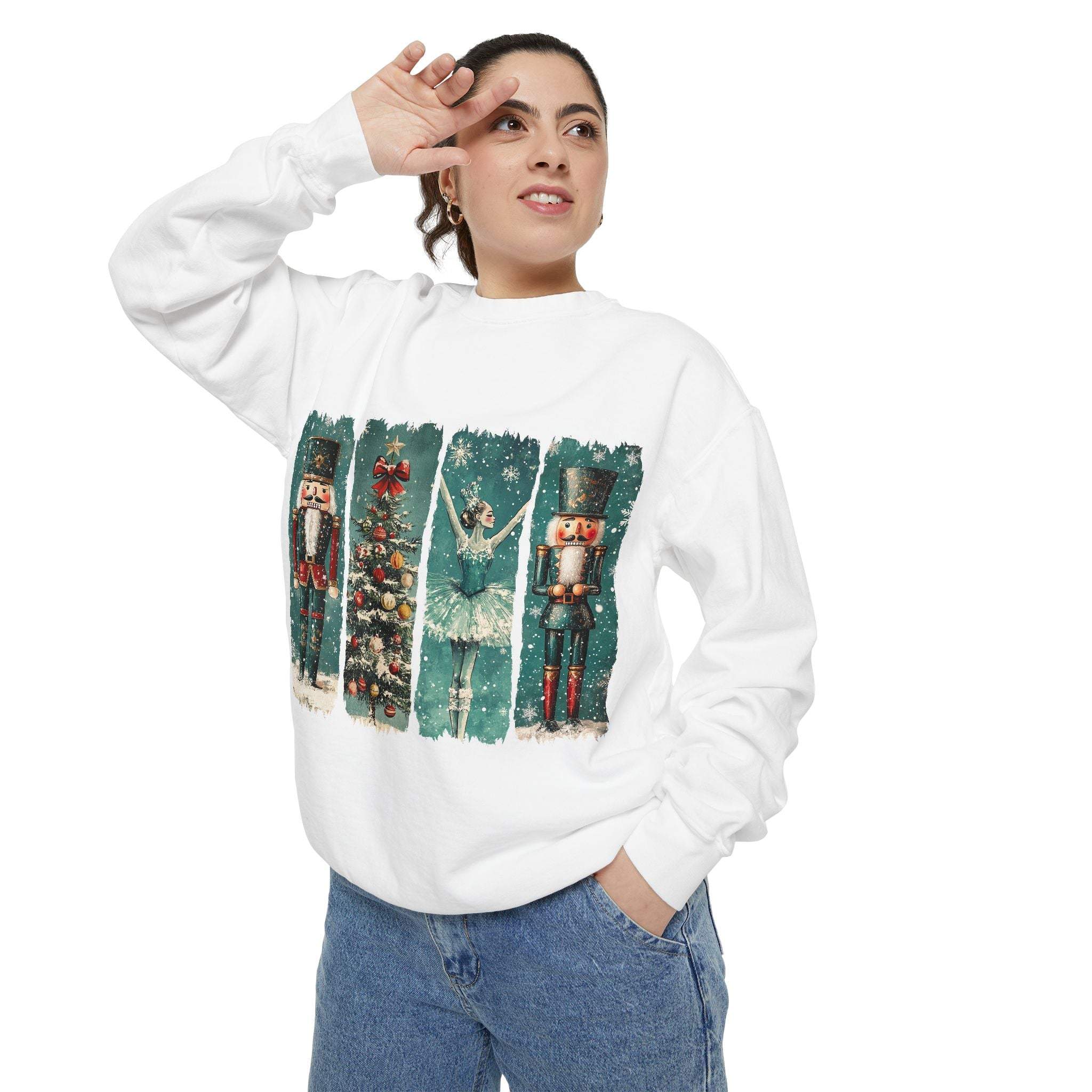 Woman wearing white Vintage Christmas Nutcracker sweatshirt with watercolor nutcracker and Christmas tree design