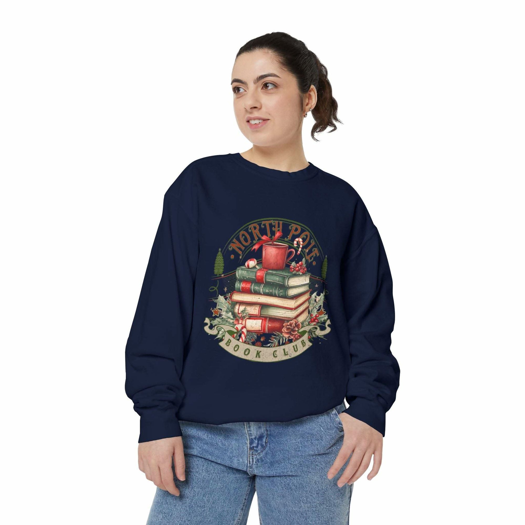 woman wearing navy Vintage North Pole Book Club sweatshirt with book and mug graphic, cotton blend, ribbed cuffs and collar