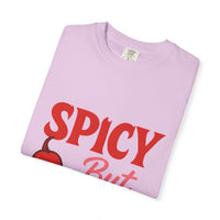 Folded light purple unisex Spicy But Sweet T-shirt with bold red text and chili graphic, made from soft garment-dyed cotton