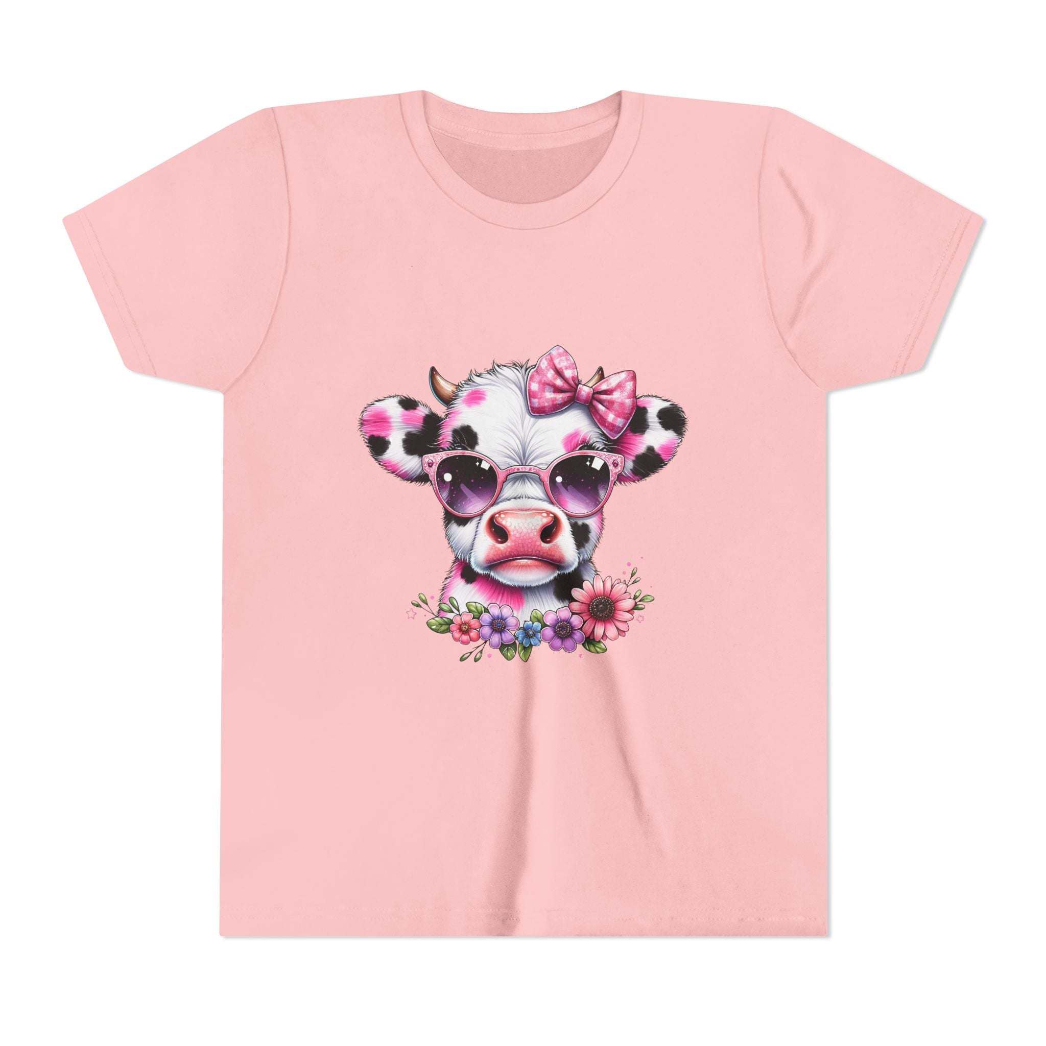 Pink t-shirt with a cow design wearing sunglasses and a bow, on a white background