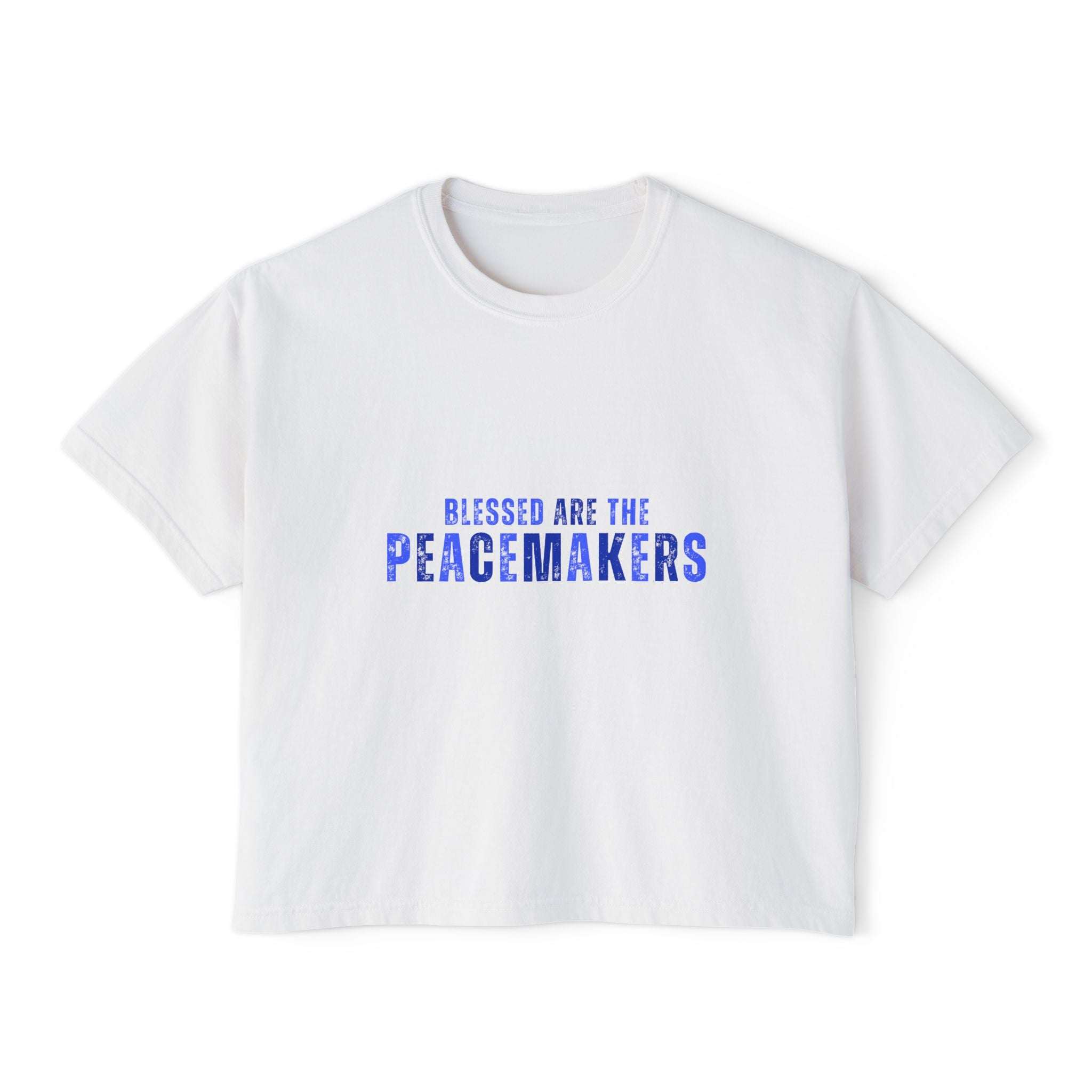 Women's white boxy tee with "Blessed be the Peacemakers" text in blue, casual and vintage style