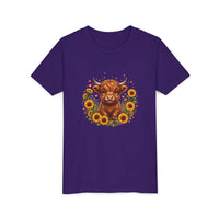 Youth tee featuring a Highland cow surrounded by vibrant sunflowers on a soft cotton shirt