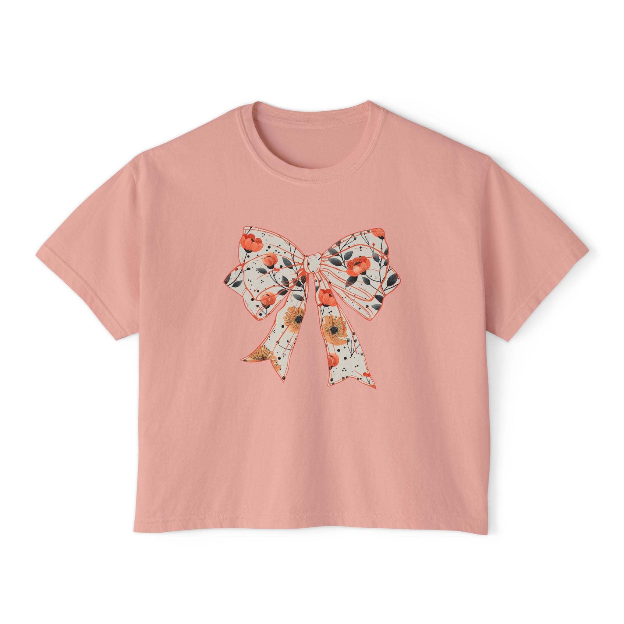Womens floral coquette bow design tee in butter color, boxy fit, made from vintage cotton by Printify