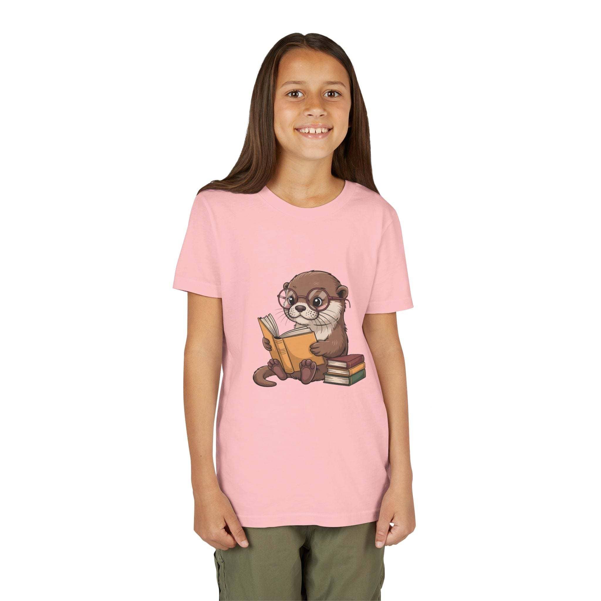 Youth tee featuring a playful reading otter design, soft and breathable for kids