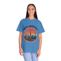 Blue garment-dyed T-shirt with Tokyo Adventures travel graphic, soft cotton fabric, and durable stitching