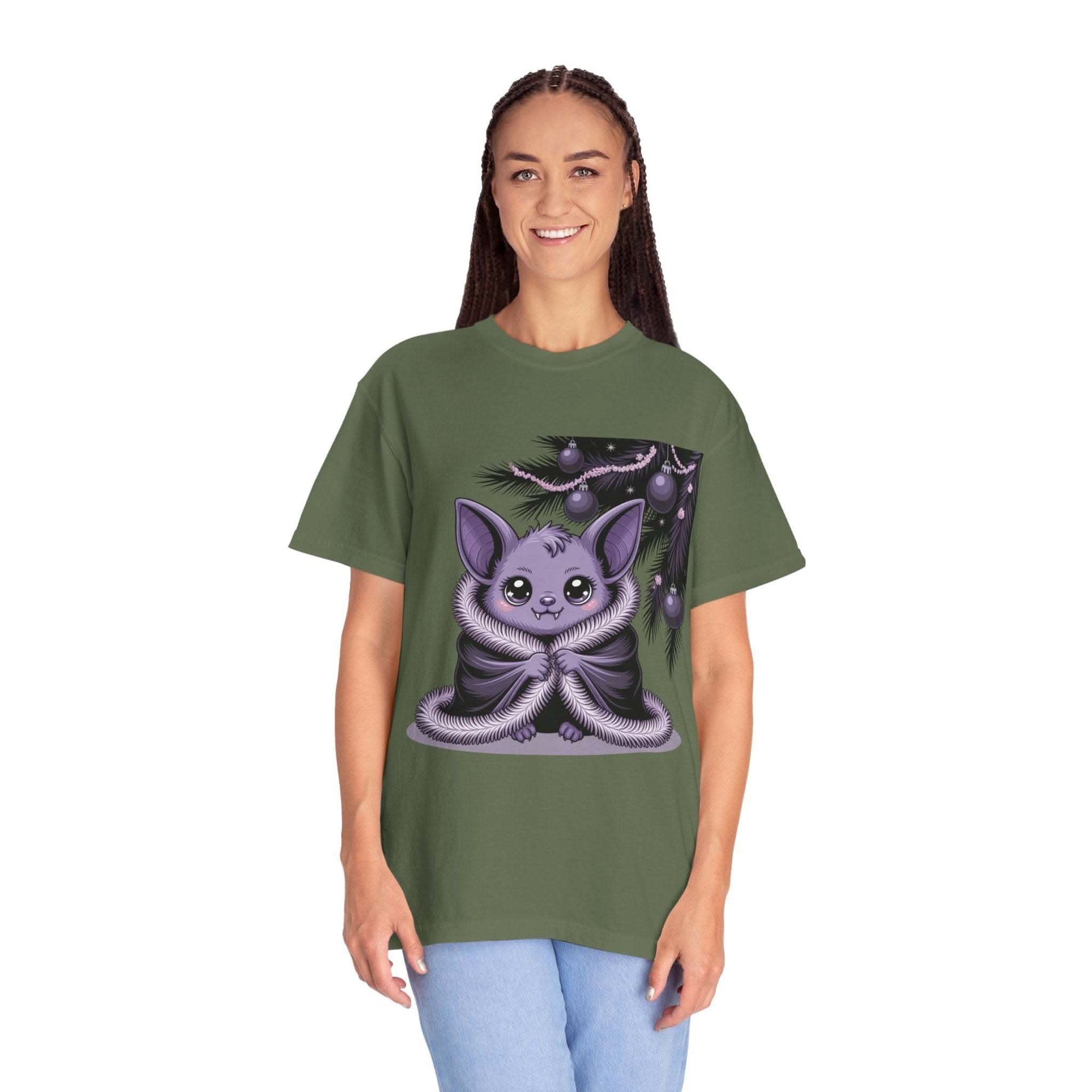 Woman wearing green Gothmas Bat T-Shirt with cute gothic bat design and festive holiday decorations