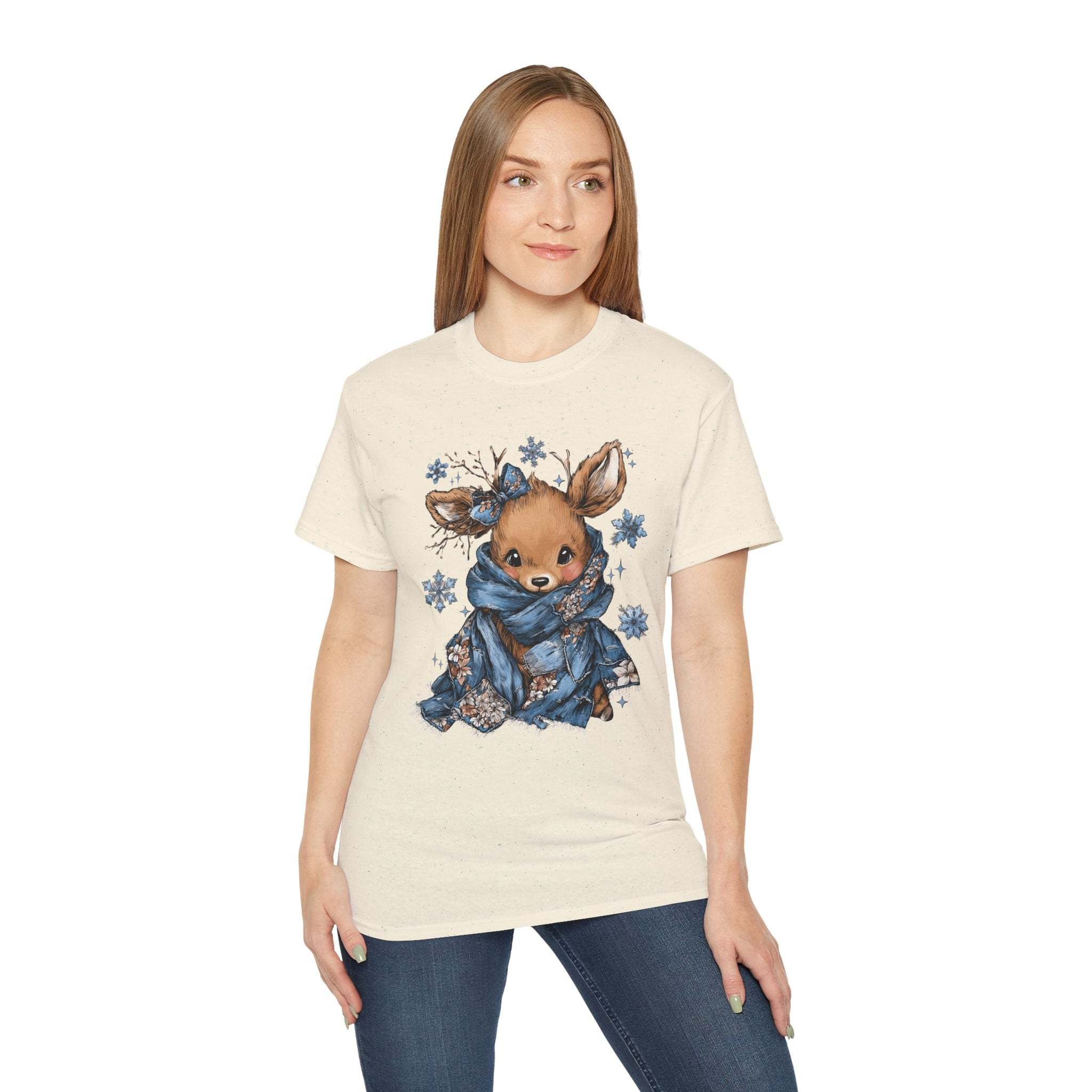 Woman wearing Retro Patchwork Reindeer t-shirt with vintage reindeer design and snowflakes in blue scarf