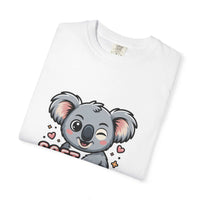 White T-shirt with a playful koala graphic and "Soft on the Outside, Savage on the Inside" text printed on it