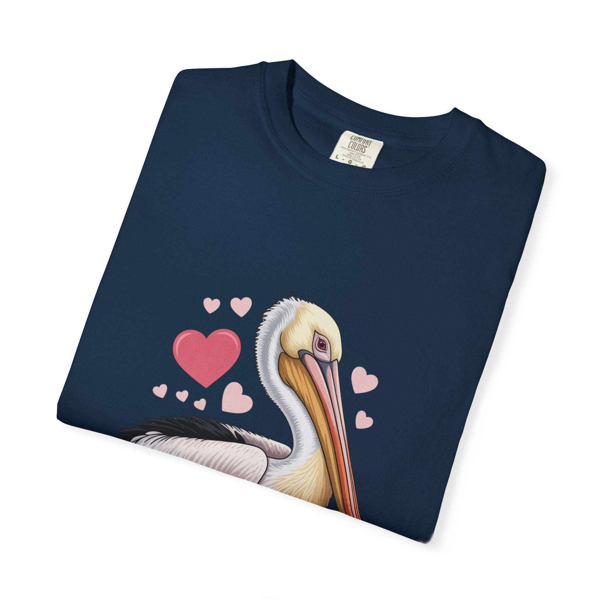 Valentine Pelican Hearts T-Shirt with pelican carrying heart on sunlit shoreline, soft cotton, vintage coastal style