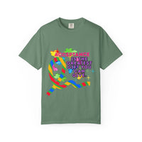 Garment-dyed green t-shirt with colorful Autism acceptance ribbon and text promoting inclusivity