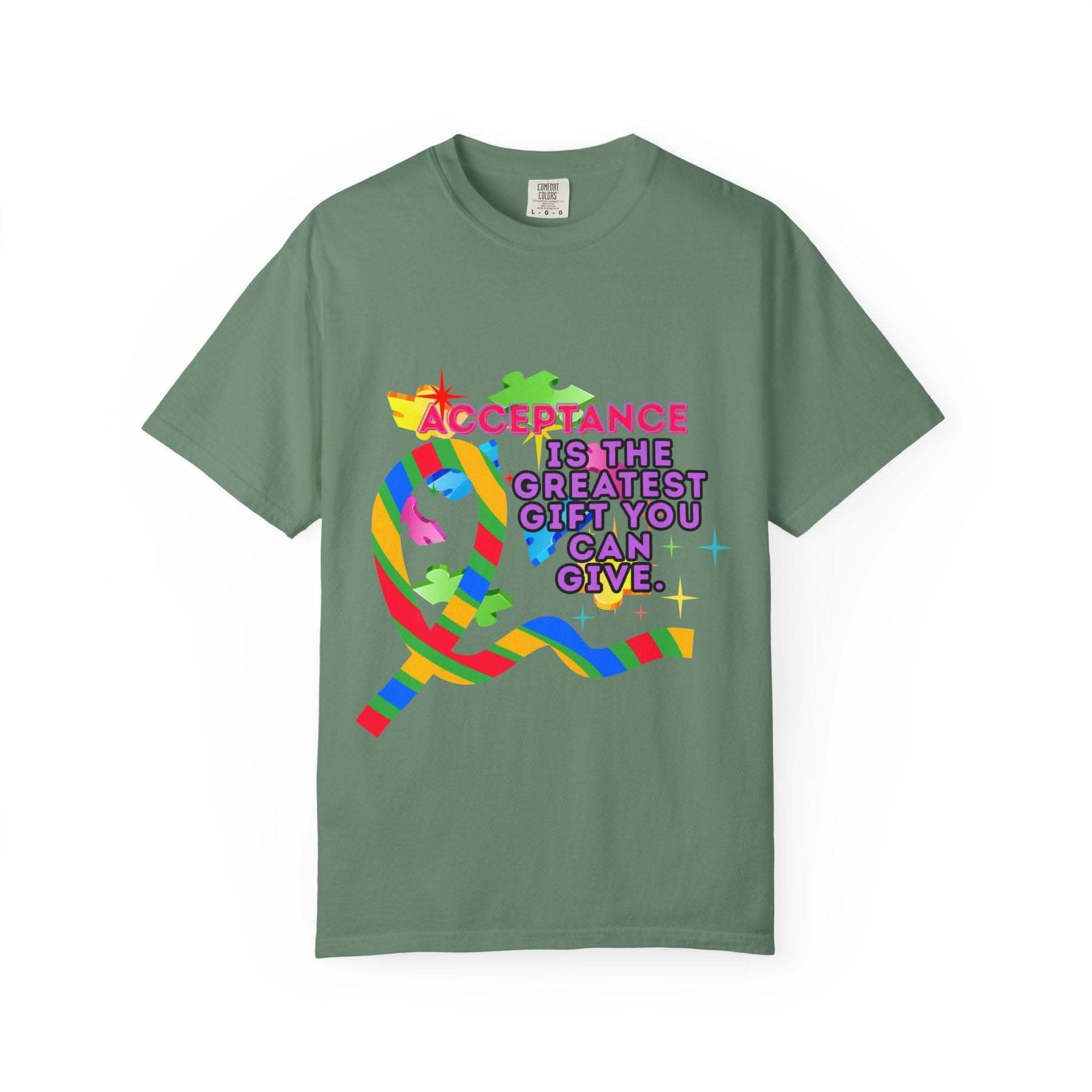 Garment-dyed green t-shirt with colorful Autism acceptance ribbon and text promoting inclusivity