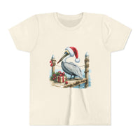 Beige t-shirt with a Christmas pelican design on a white background