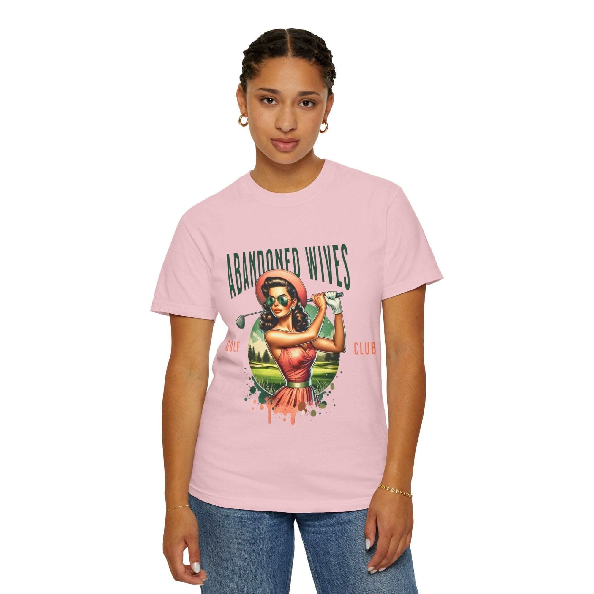 Vintage unisex t-shirt with Abandoned Wives Golf Club graphic in pink, made of soft ring-spun cotton.