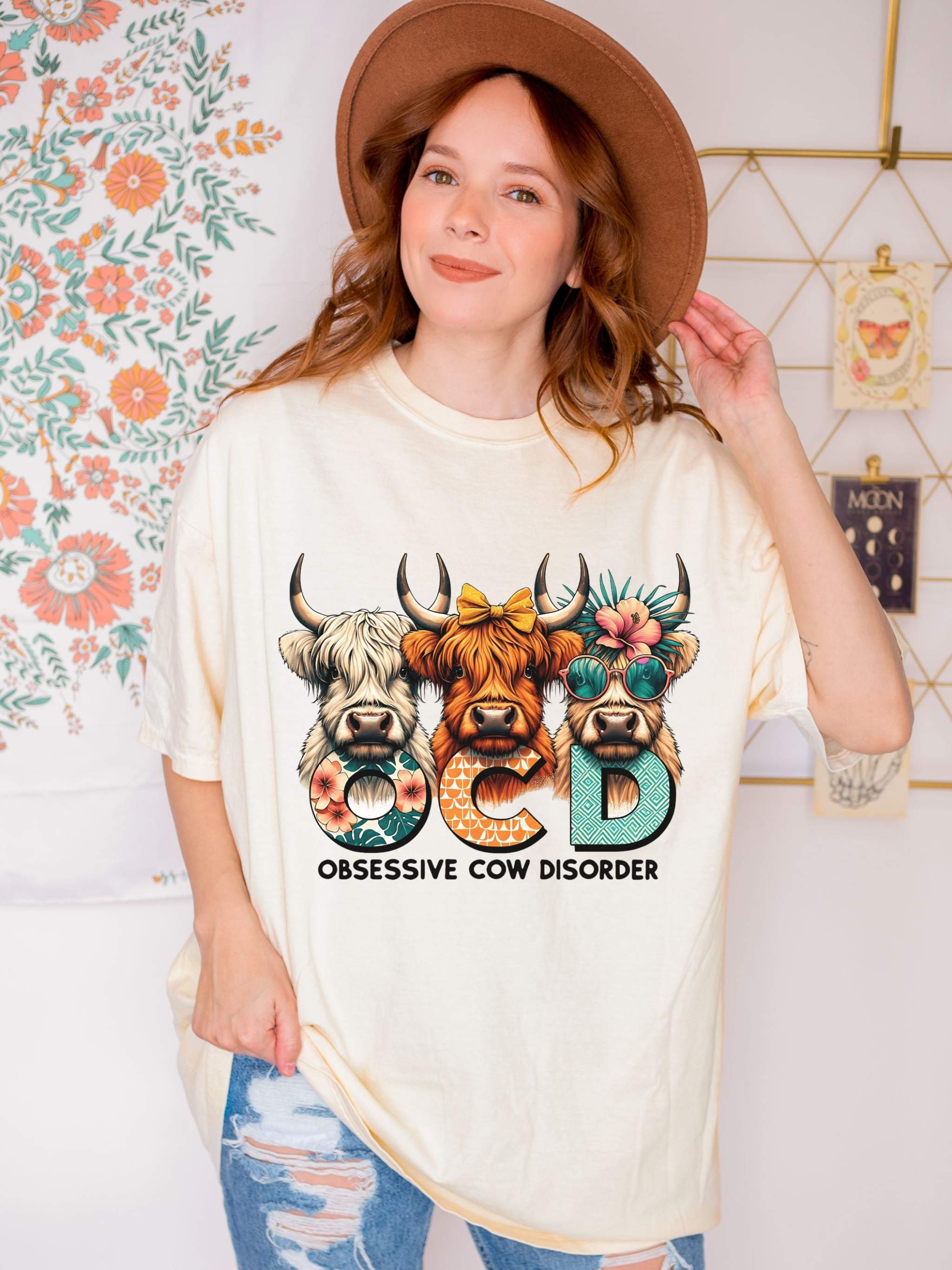 Woman wearing funny OCD Obsessive Cow Disorder T-shirt with cow illustrations and text design