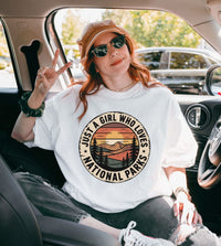 Woman wearing Just a Girl Who Loves National Parks T-Shirt made of soft, durable garment-dyed cotton