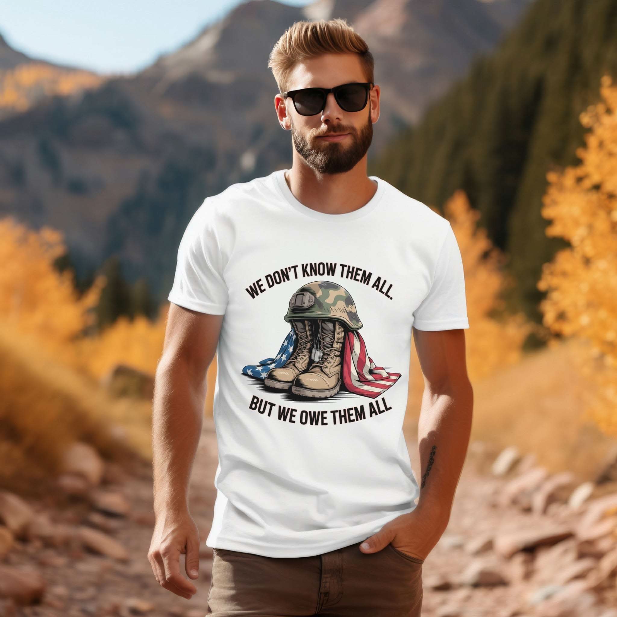 Veteran T-shirt with "We Don’t Know Them All But We Owe Them All" message honoring service and sacrifice