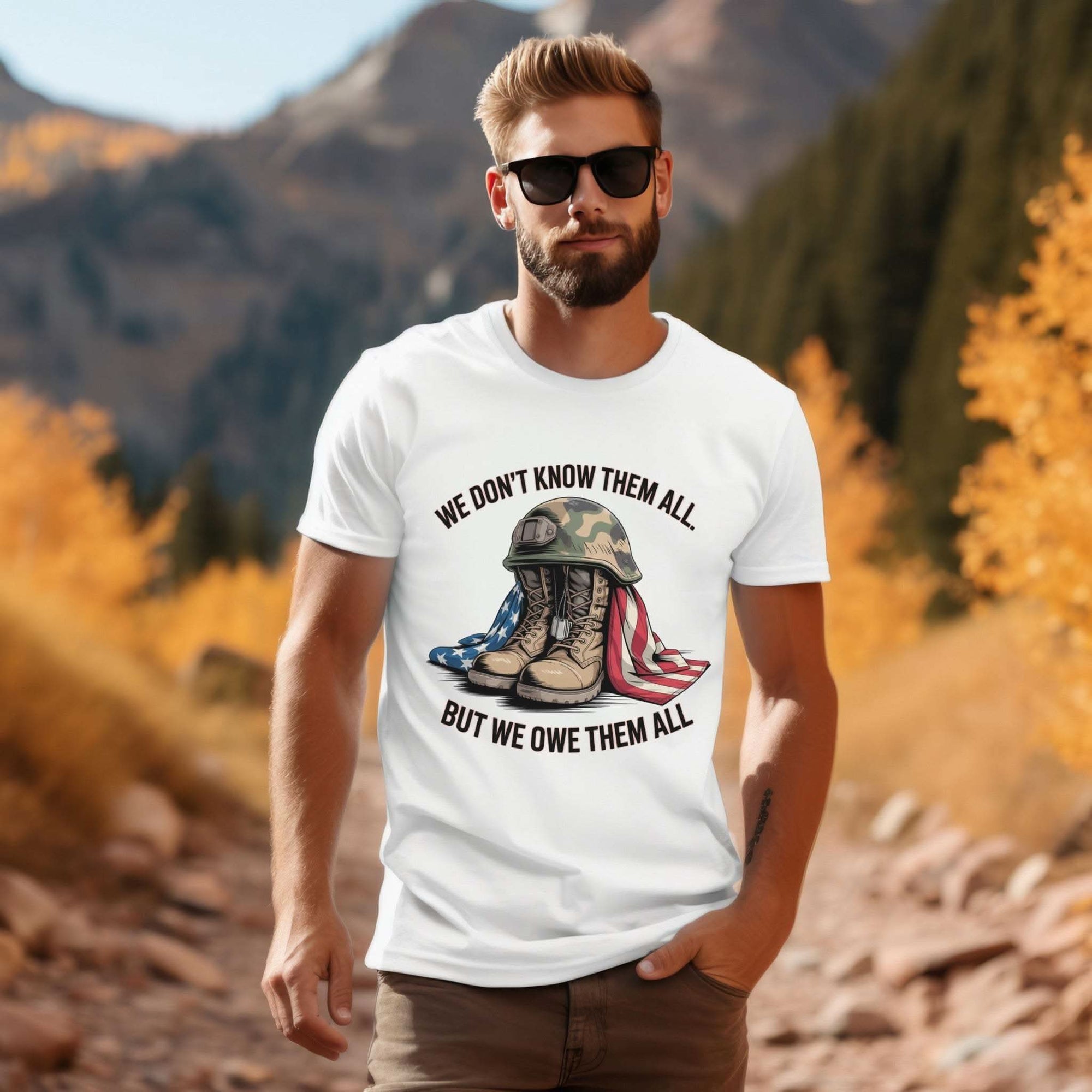 Veteran T-shirt with "We Don’t Know Them All But We Owe Them All" message honoring service and sacrifice