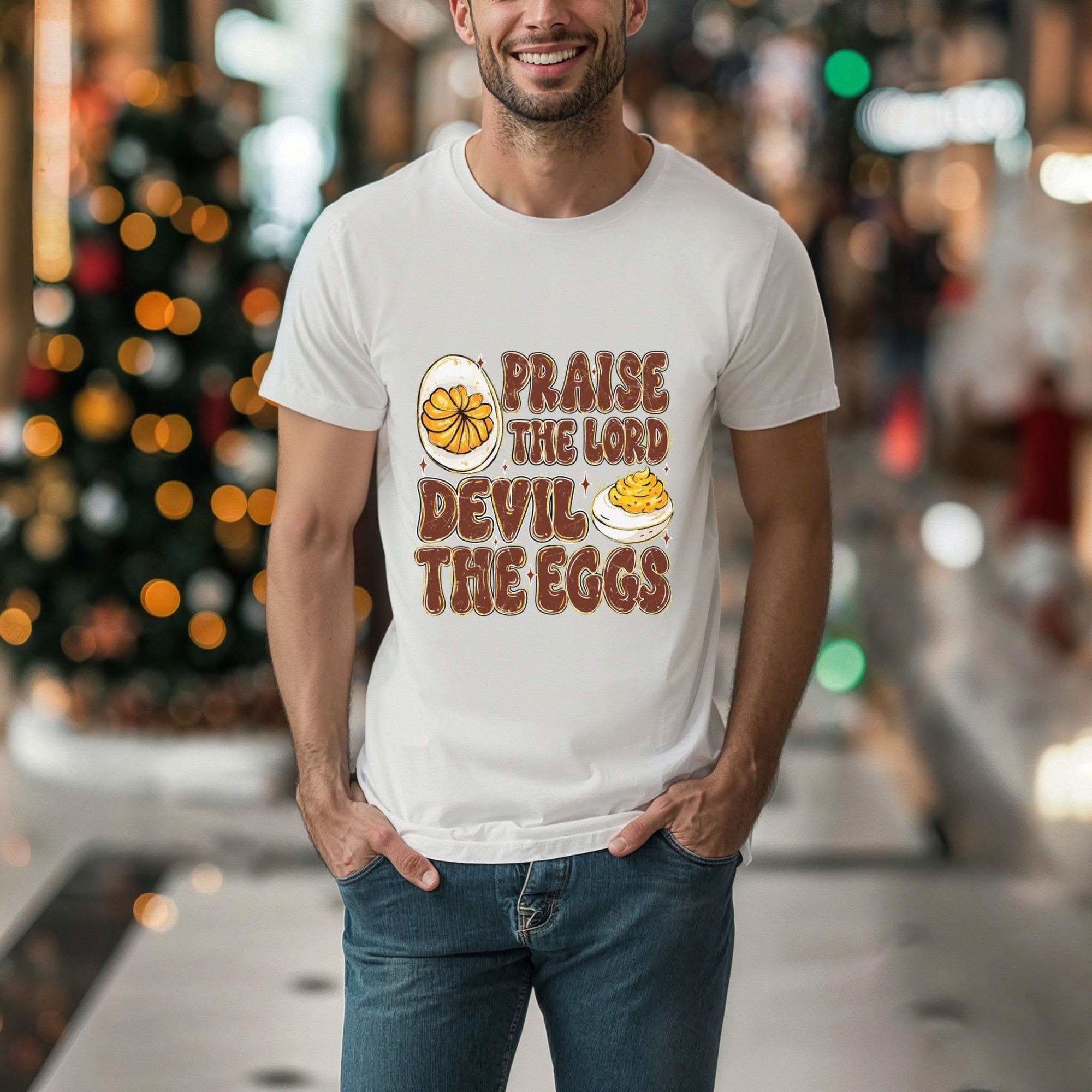 Religious unisex t-shirt with playful "Praise the Lord, Devil the Eggs" text on soft garment-dyed cotton