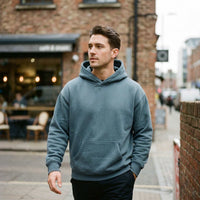 oversize fleeced hoodie in heavyweight cotton blend with drop shoulder and adjustable hood for unisex streetwear style