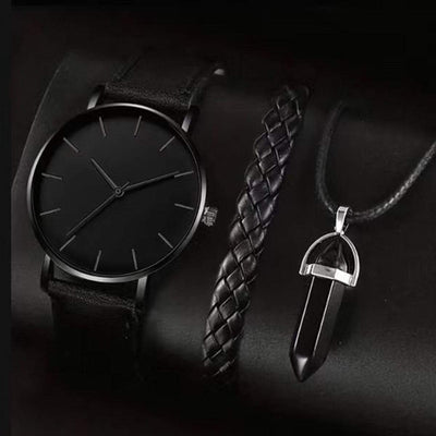 Men's black disc watch with round dial, black imitation leather strap, braided bracelet, and black stone pendant necklace three-piece set