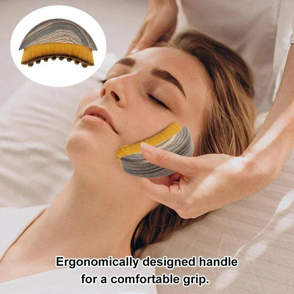 Portable dry facial brush with soft bristles for gentle exfoliation and lymphatic massage