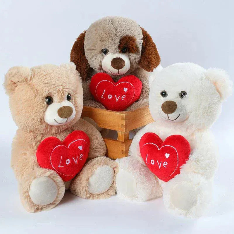Three cute heart bear and dog plush toys holding red love heart pillows Valentine's gifts