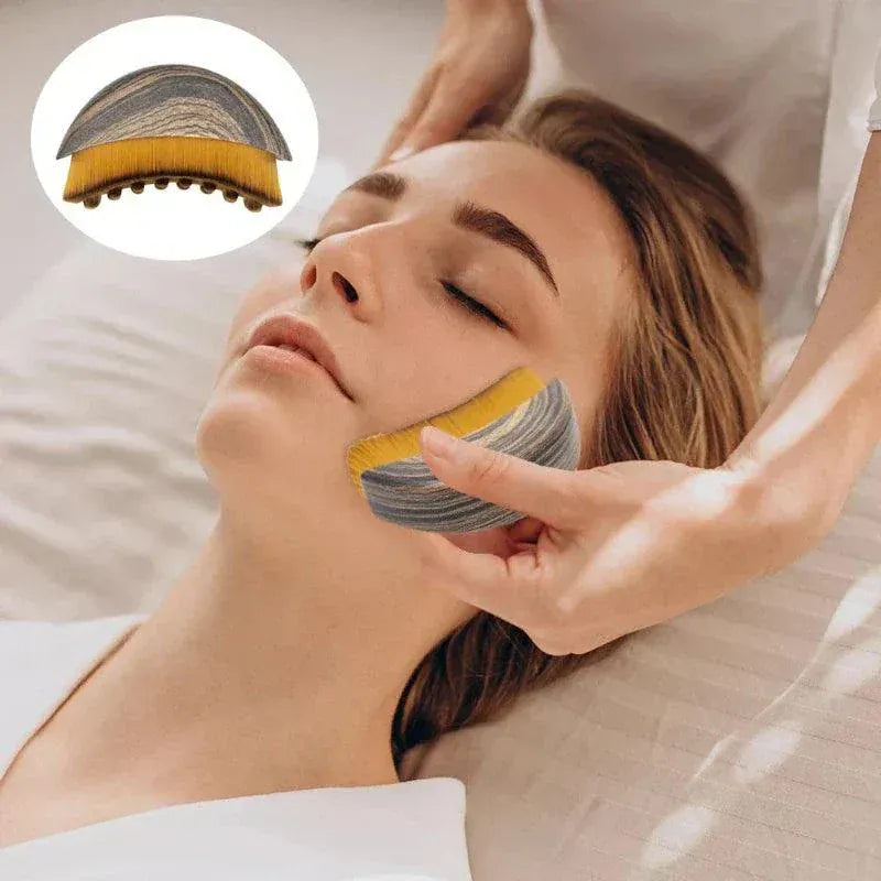 Portable dry facial brush with soft bristles for gentle exfoliation and lymphatic massage