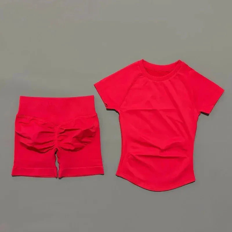 Woman wearing Impact Sports Sets seamless yoga top and high-rise workout shorts for active performance