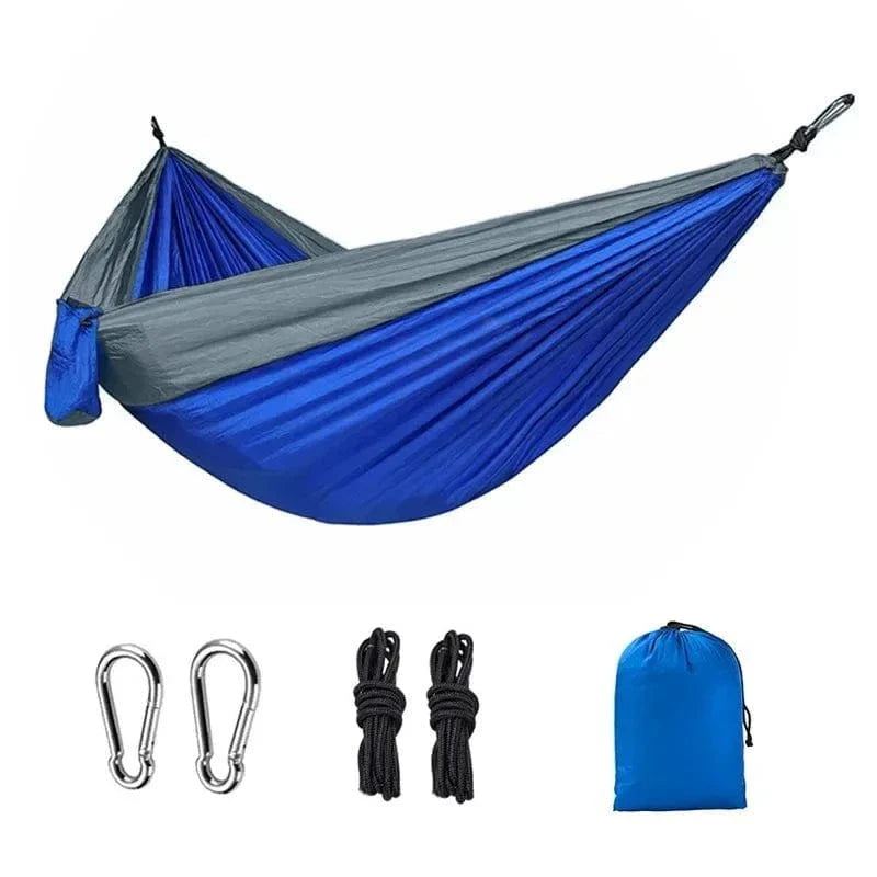Portable single person nylon hammock with carabiners, ropes, and storage bag for outdoor camping