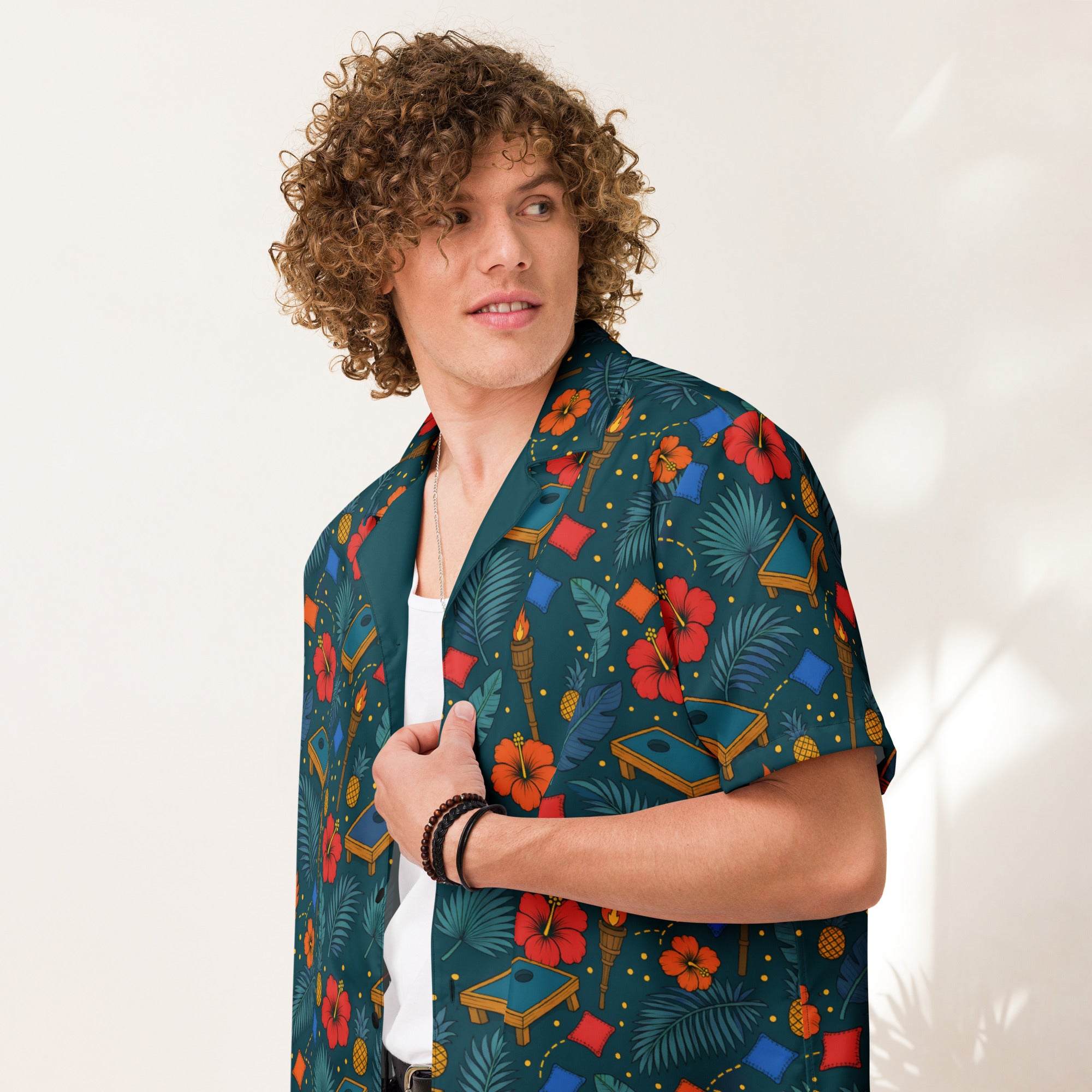 Tropical cornhole Hawaiian shirt with boards, bean bags, tiki torches, and hibiscus on teal background, unisex UPF 50+ button-up
