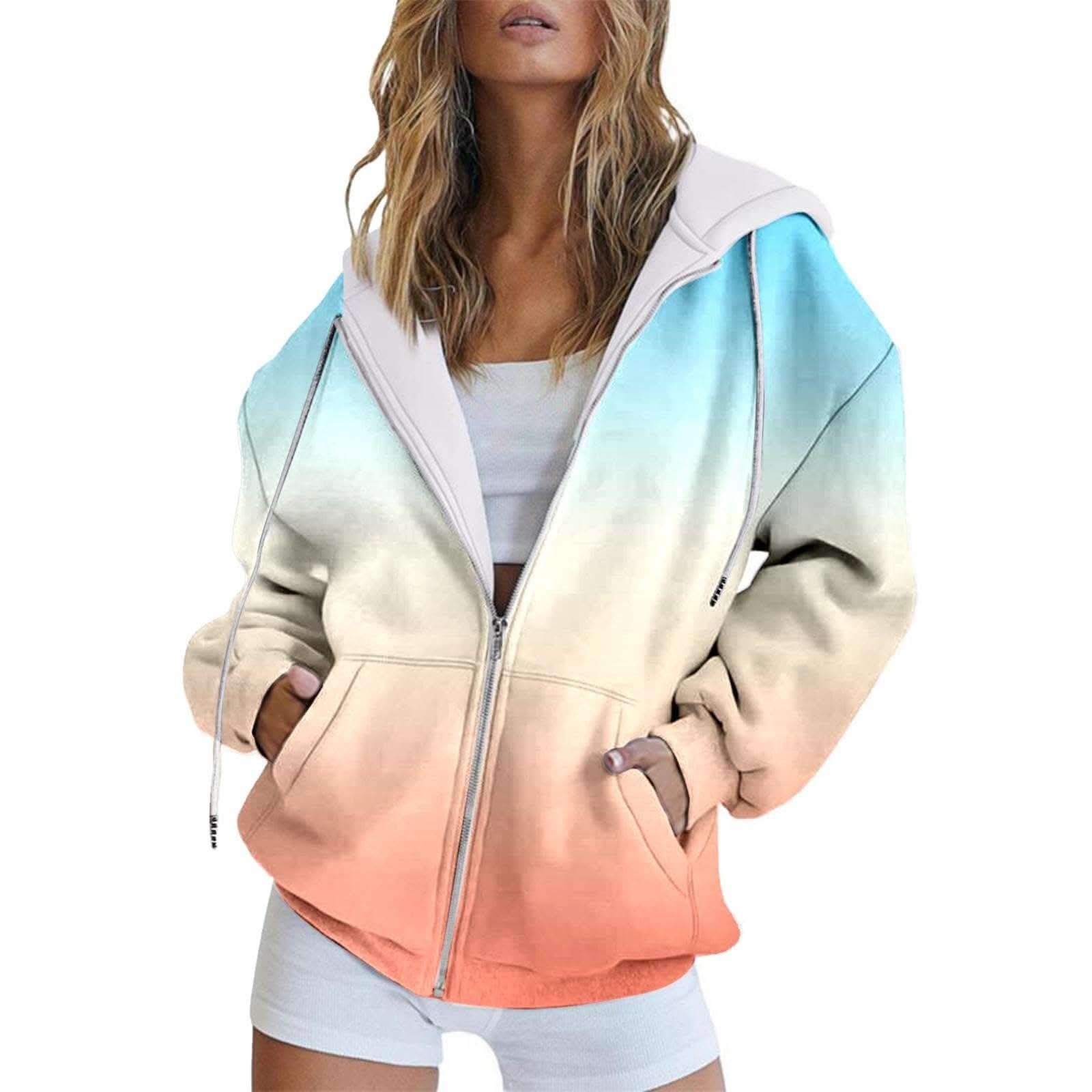 Woman wearing orange chic off-shoulder zip hoodie with long sleeves