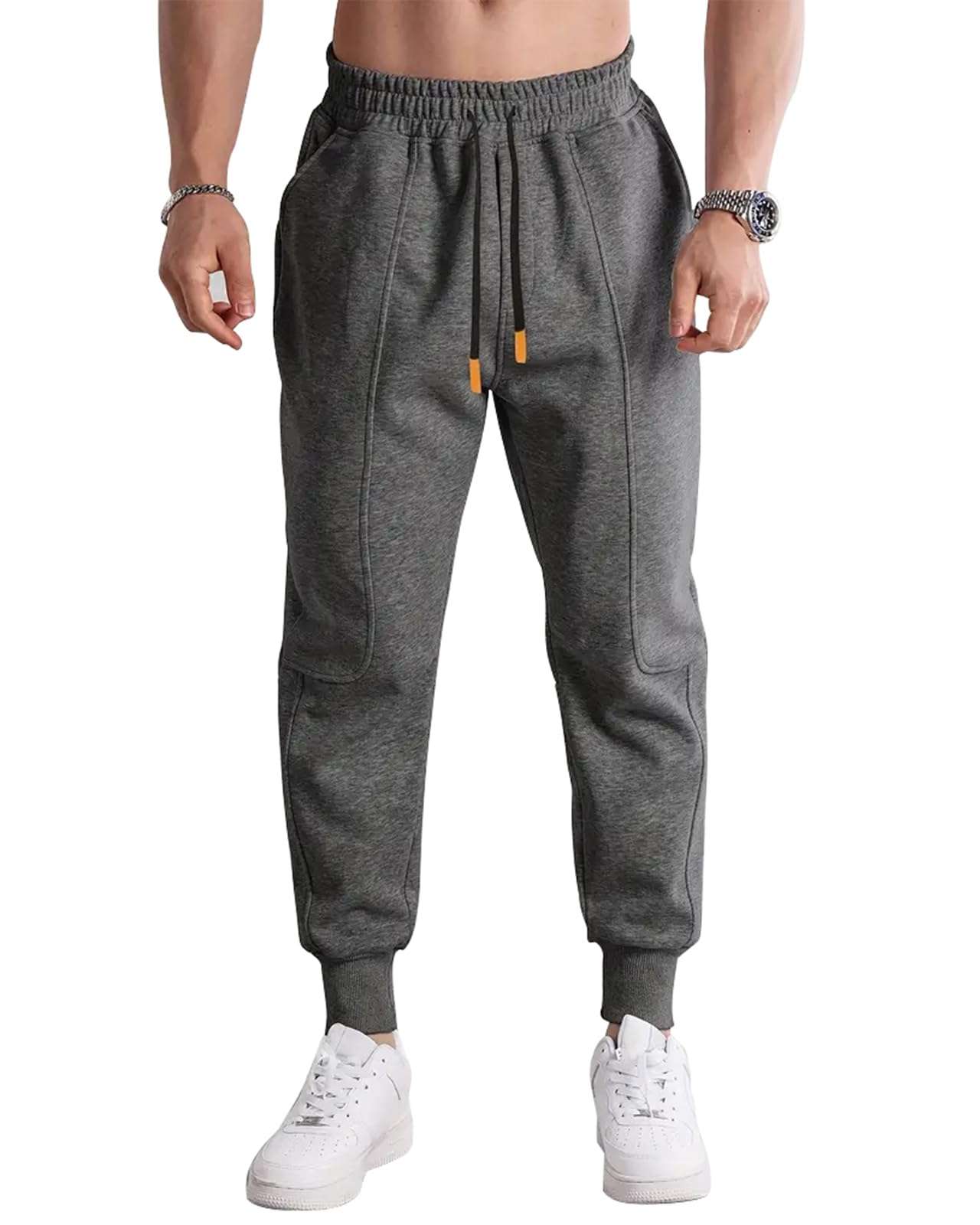 Mens athletic joggers with flexible fit, four pockets, and tapered legs for casual and workout wear
