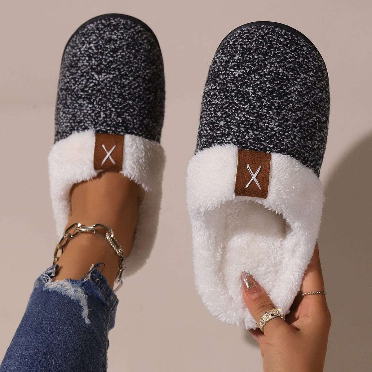 Cozy winter plush slippers with anti-slip soles and cartoon pattern, available in burgundy, black, and light gray for home use.